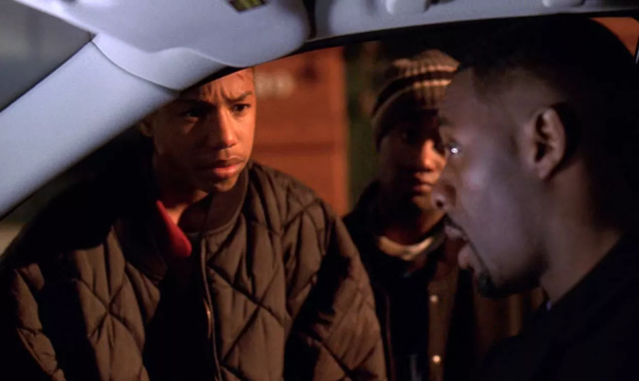 Wallace and Poot talking to Stringer.